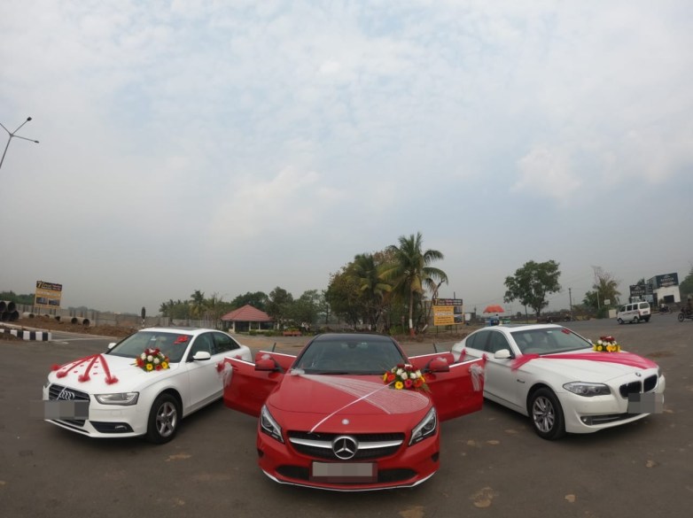 A stylishly decorated Audi A4 wedding car with sleek lines and [mention prominent design details]. Choose IndiaTaxi for a sophisticated and sporty wedding transportation experience.